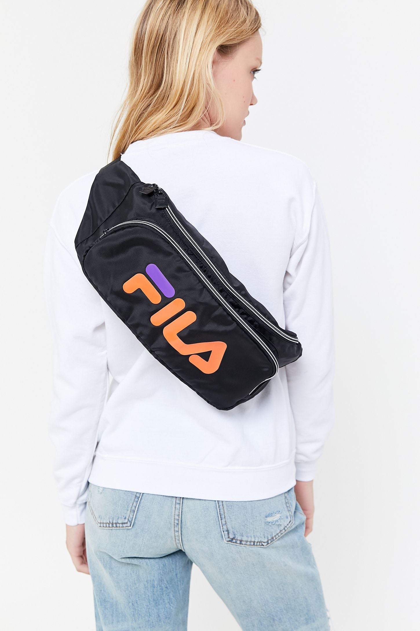 fila mini backpack urban outfitters Fila Sling Pack Black