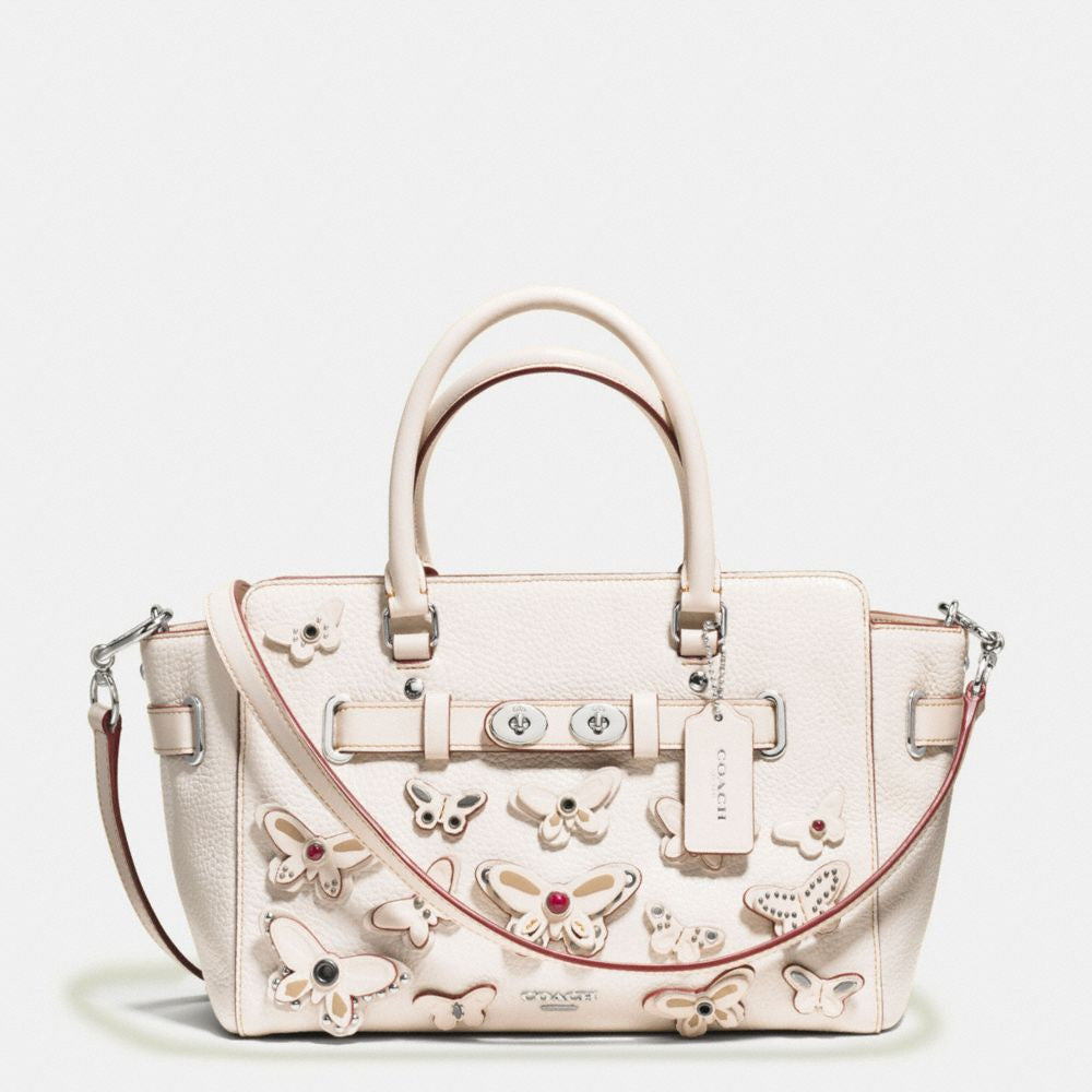 Coach purses discount with butterflies